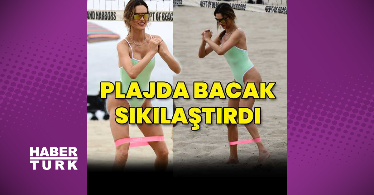 Alessandra Ambrosio, plajda bacak sıkılaştırma egzersizi yaptı